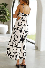Krishelle Doodle Printed Cutout Waist Pocketed Loose Midi Dress