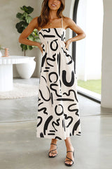 Krishelle Doodle Printed Cutout Waist Pocketed Loose Midi Dress